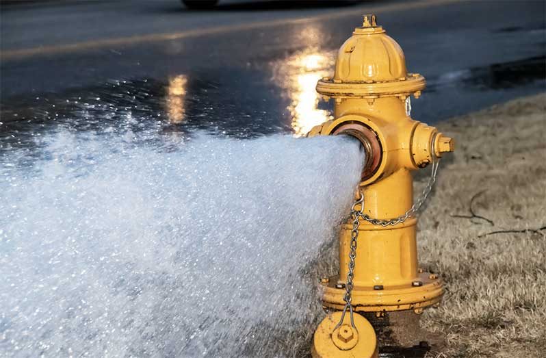 Close-up of waterworks HDPE pipe and hydrant fitting